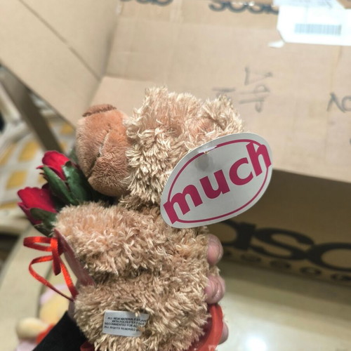 Plush teddy bear with roses like new, romantic gift