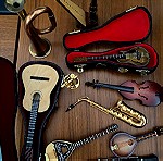  Σετ με 10 μινιατούρες μουσικά όργανα ( ξύλινα και μεταλικα )