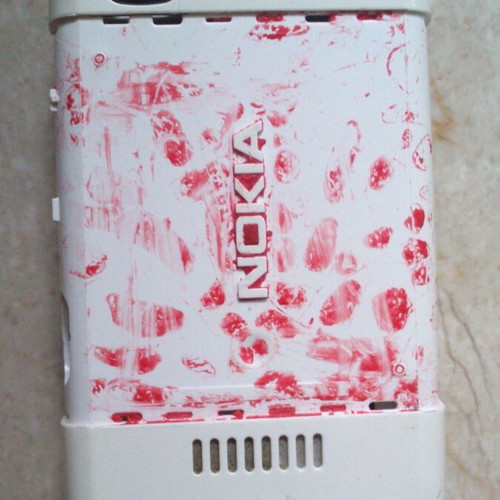 Nokia 5200 used, functional internal parts, no battery, charger included
