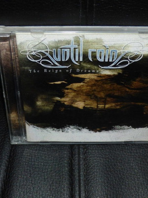 Until Rain The Reign Of Dreams CD used, metal