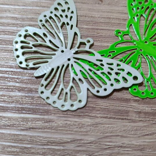 Dangling earrings new, green metal