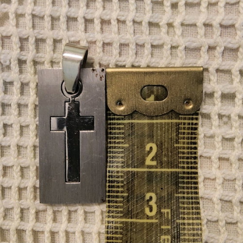 Pendant with steel cross like new, silver color