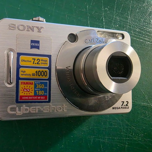 Sony Cyber-shot DSC-W70 digital camera with battery and charger
