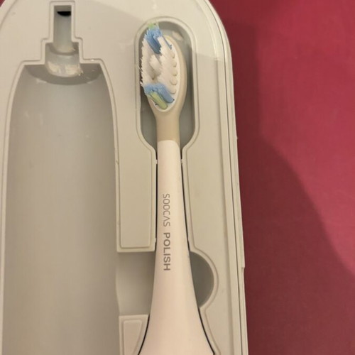 Electric toothbrush used with new replacement head