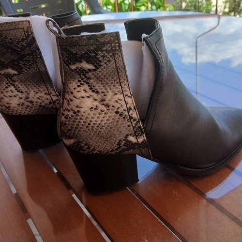 Estil women's black ankle boots with snake print detail