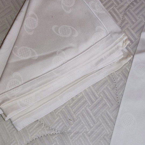 Tablecloth set with 12 napkins used, white