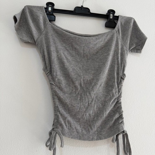 Women's gray blouse with short sleeves and drawstrings used, size S