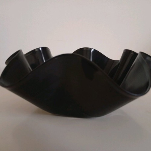 Bowl made from vinyl record used, asymmetrical
