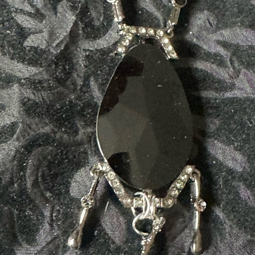 Black steel necklace like new with stone and gems