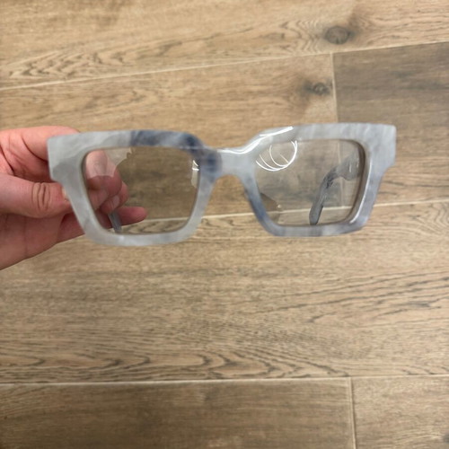 Off White marble sunglasses like new with box and case