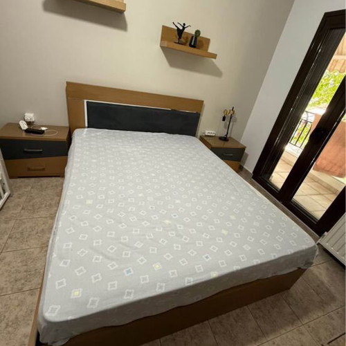 Bedroom set with bed, mattress, storage, 2 nightstands and dresser like new