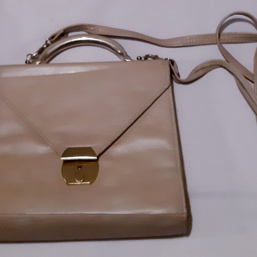 Handbag beige genuine leather used with metal details and lock