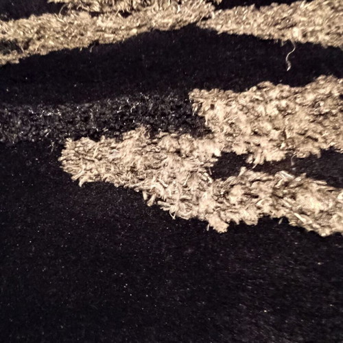 Black and silver rug with embossed designs 216x155 cm