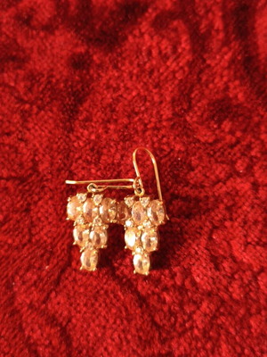 Silver earrings used, gold plated