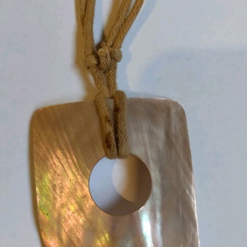 Pendant used made of shell
