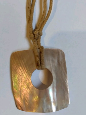 Pendant used made of shell