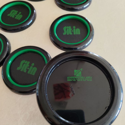 Coaster set of six plastic pieces with holder, like new