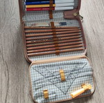 Beige pencil case, complete