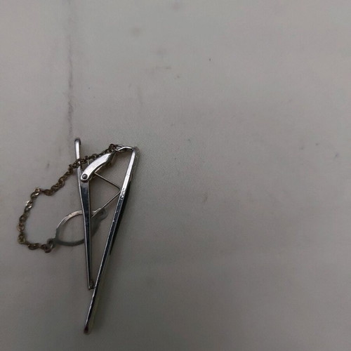 Tie clip used, with chain, white