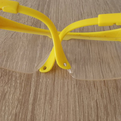 Hilka safety glasses used with adjustment and cord holes