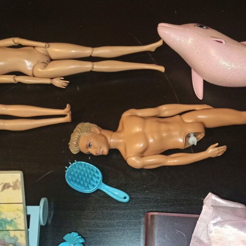 Barbie and other toys used, in moderate condition