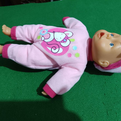 Doll with sounds and speech with soft body like new