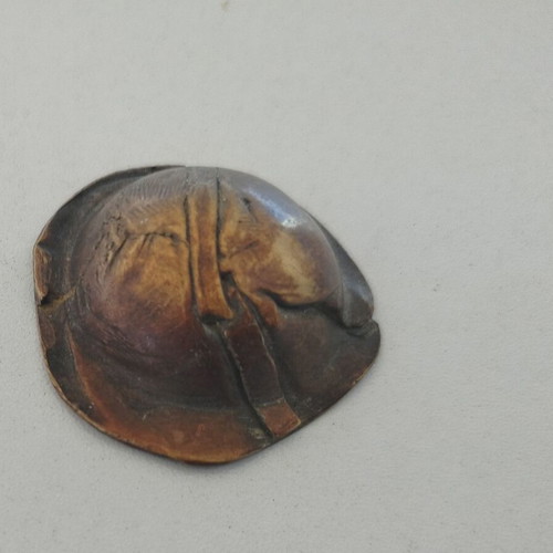 Bronze decorative item used with oxidation and scratches