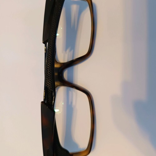 Carrera eyeglass frame used, black with light brown