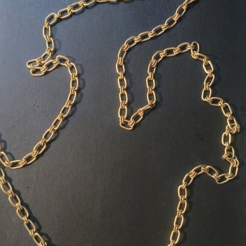 Long steel necklace chain like new, gold tone