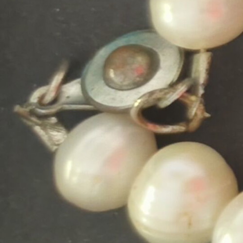 Necklace with pearls and rhinestones used