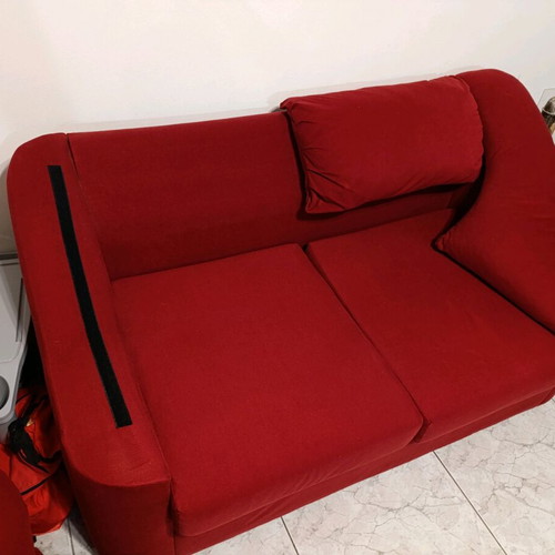 Two-seater waterproof sofa like new with removable cushions
