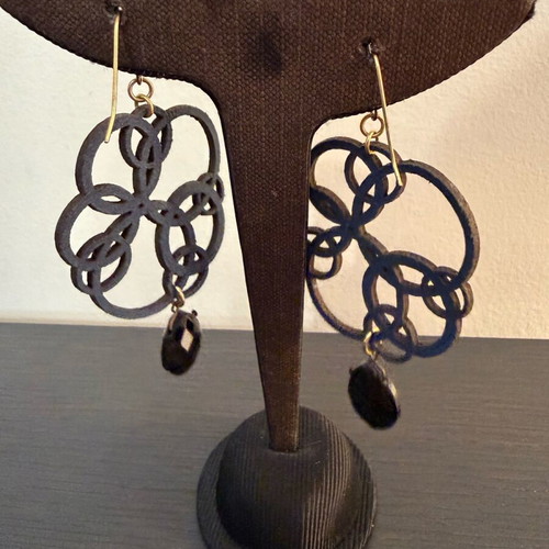Earrings with blue laser cut leather flower design like new