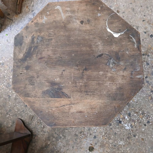 Vintage wooden table used, Victorian era with octagonal surface