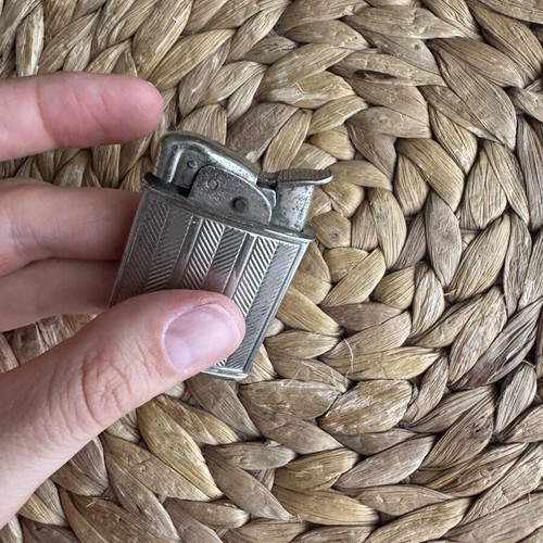 Evans Vintage lighter used with wear