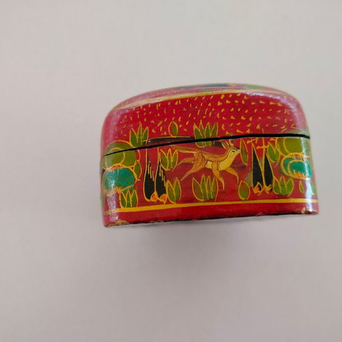 Decorative papier-mache box used with colorful patterns