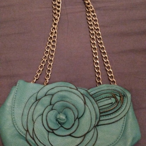 Green shoulder bag with flower