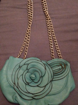 Green shoulder bag with flower