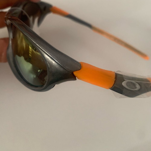 Oakley sunglasses, orange with gold lime chameleon lenses