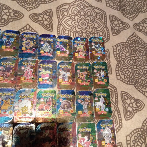 Pokemon metal tags like new, 43 pieces