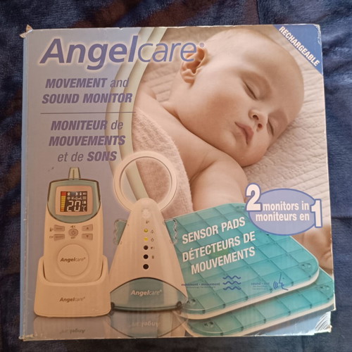 Baby monitor used with sound and movement detection and room temperature display