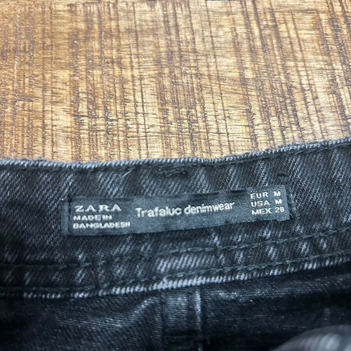 Zara Trafaluc black distressed denim mini skirt, size M