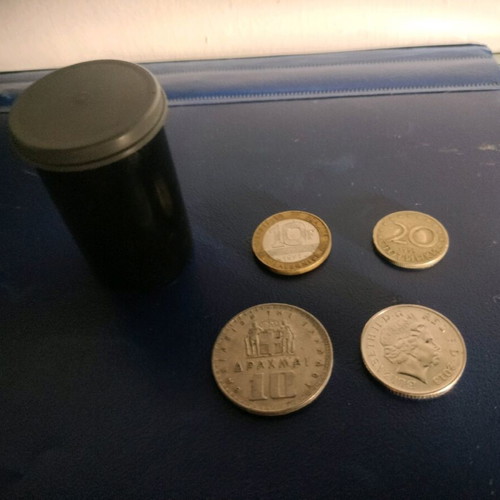 Coins like new, 4 from various countries with case