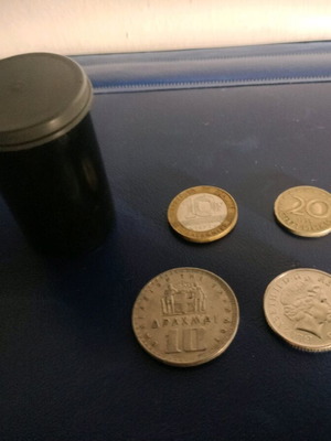 Coins like new, 4 from various countries with case