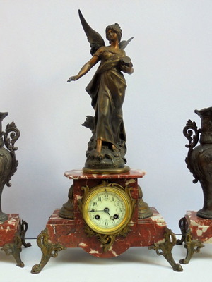 Clock with Louis Moreau statue and marble base, French late 19th century