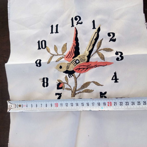 Vintage machine embroidery clock with bird on beige fabric new