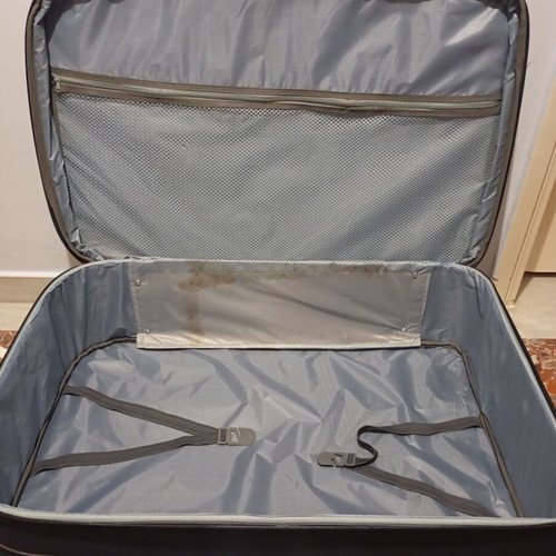 Lumi travel suitcase used with broken wheels