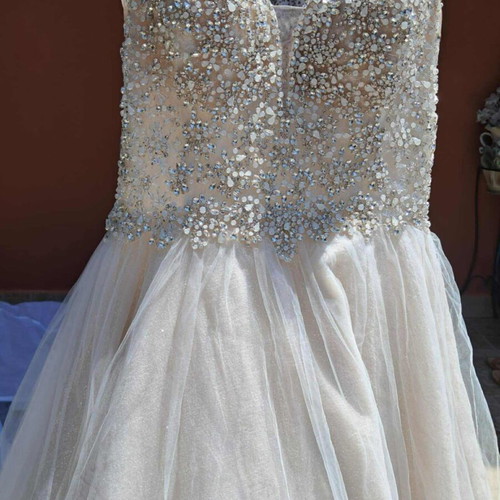 Cream wedding dress like new with stones and train