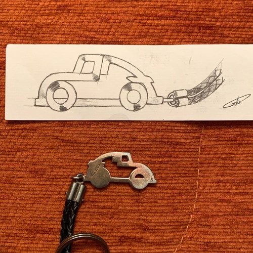 Costis car keychain with eye used, silver