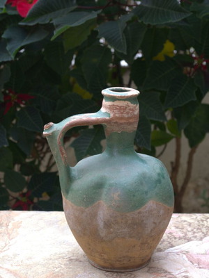 Ceramic jug used with green glaze
