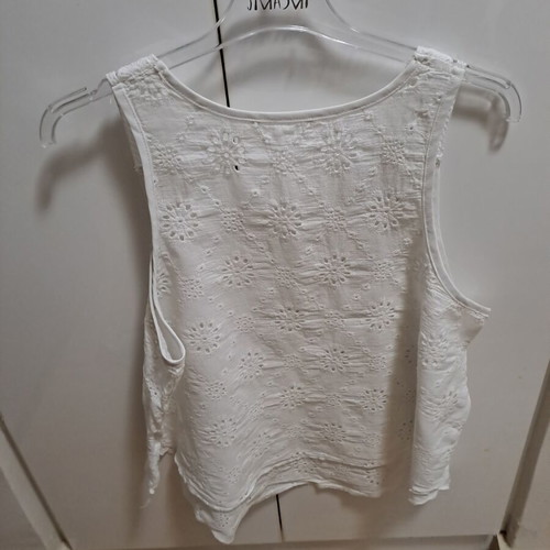 Sleeveless white top